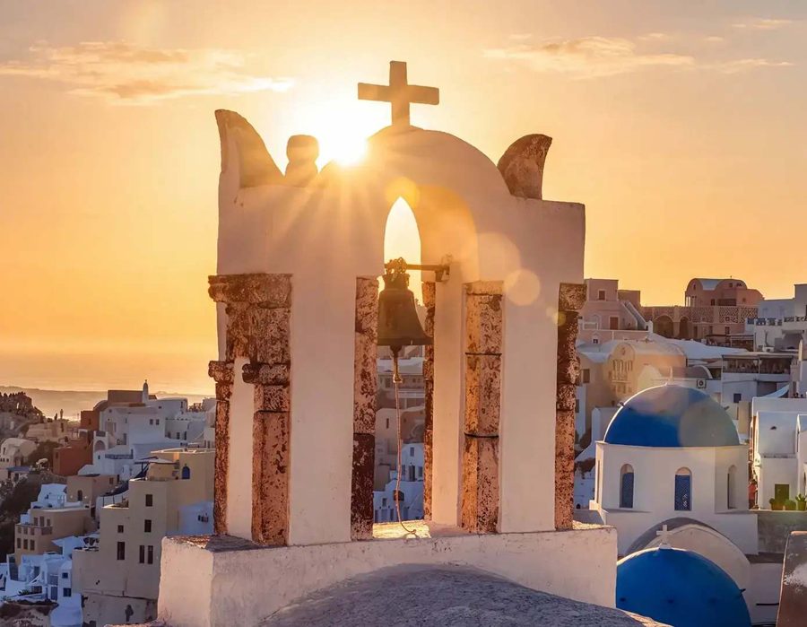 Santorini bell tower at sunset