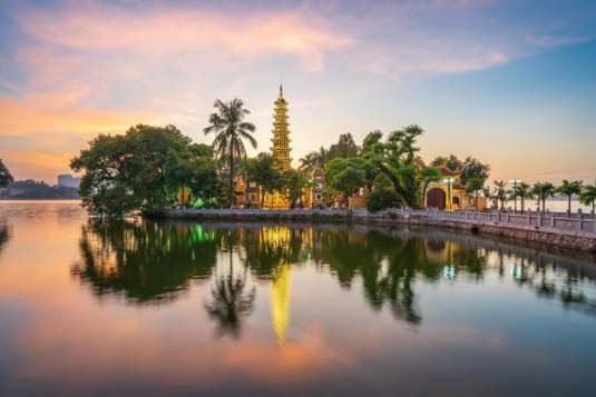Pagoda reflected in a lake in Hanoi